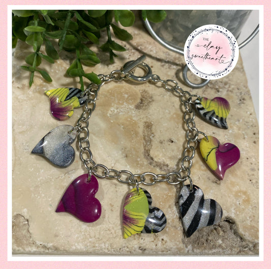 5002 Stainless steel and polymer clay charm bracelet